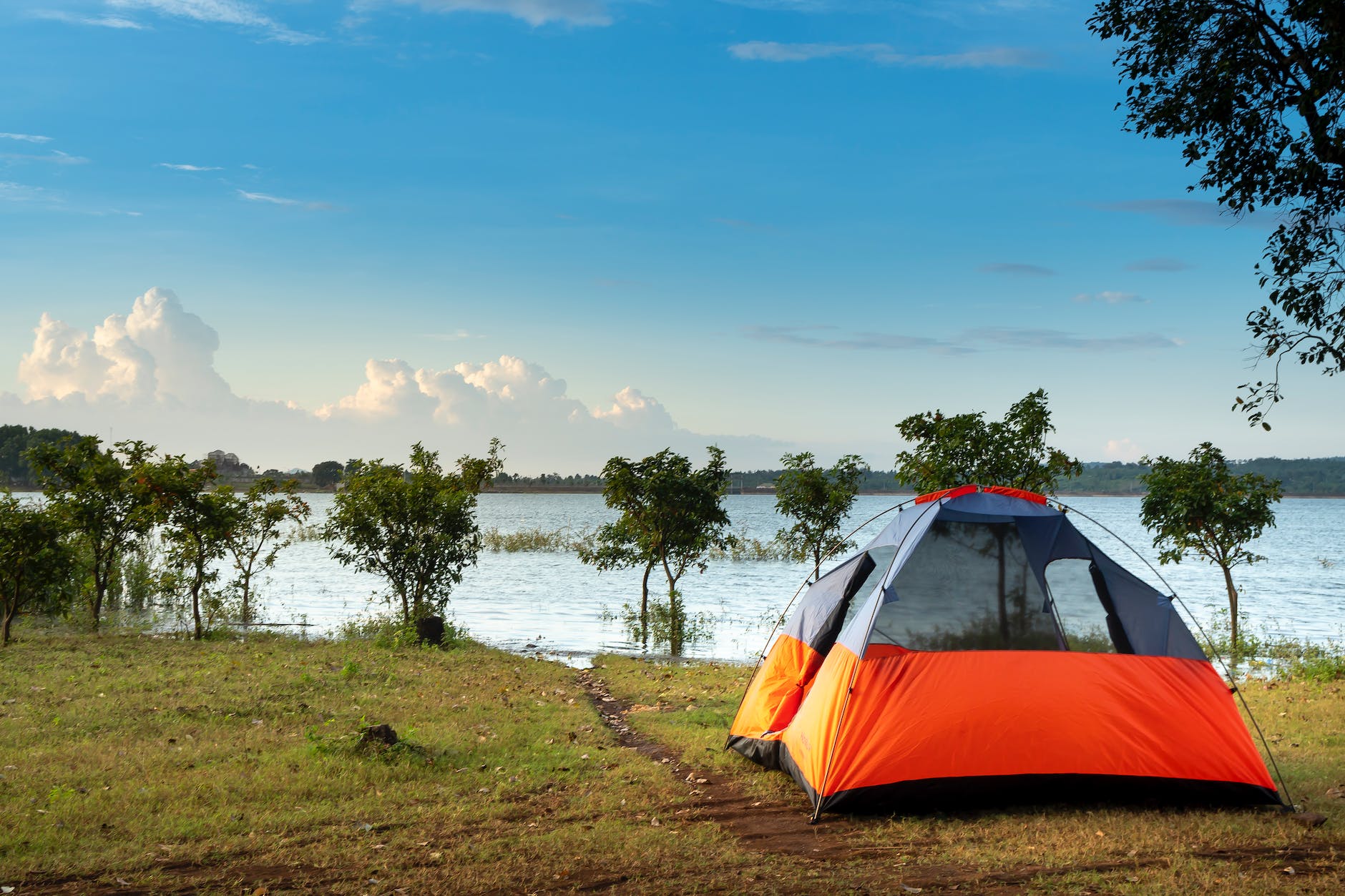 camping dome tent near a body of water