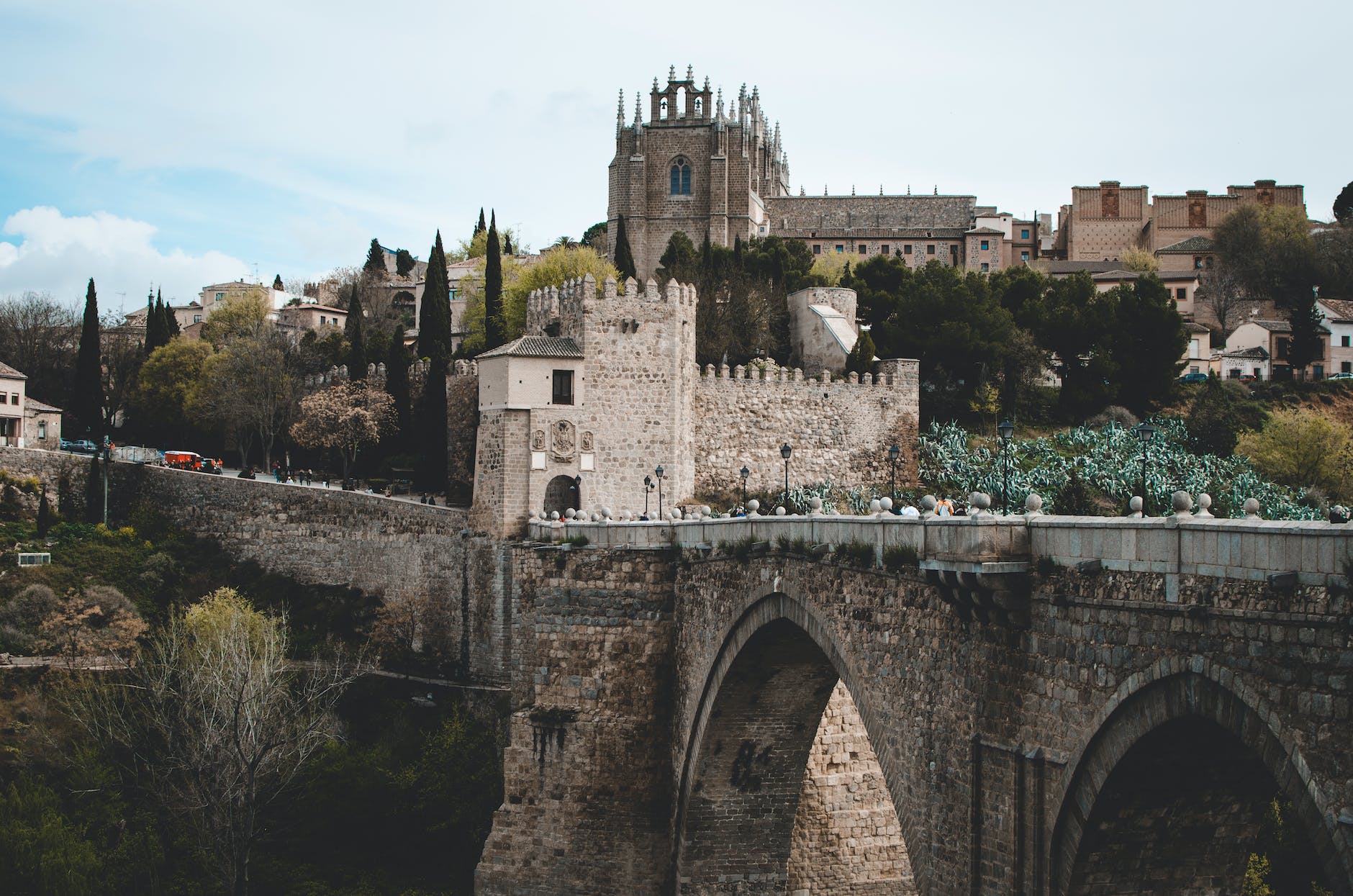 photo of gray castle and bridge